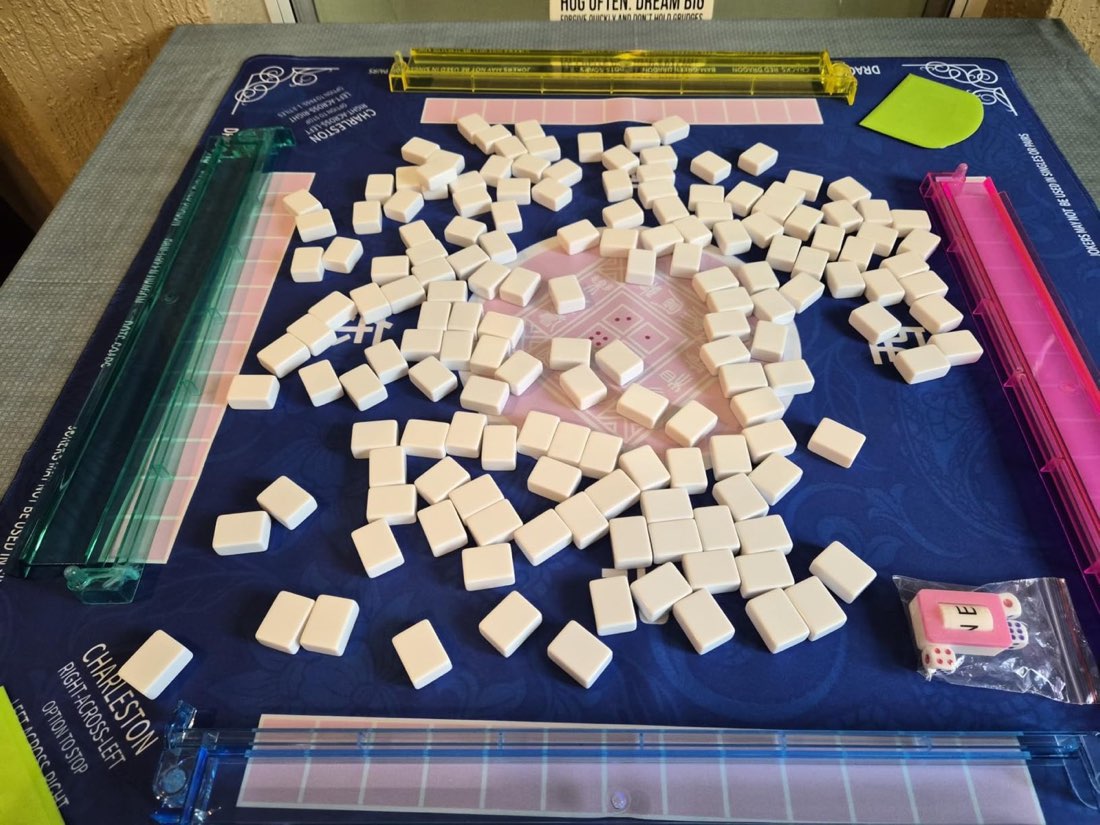 Tiles face down for the shuffle on a blue 2F22E mat