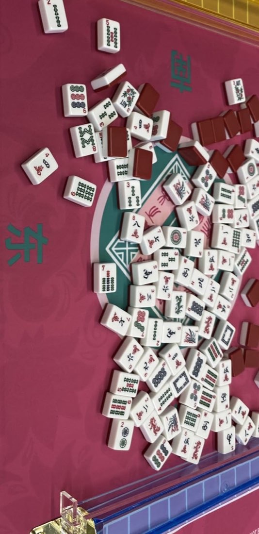 A game in progress on a pink 2F22E mat